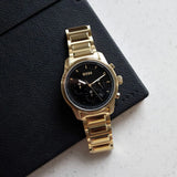 Hugo Boss Trace Chronograph Black Dial Gold Steel Strap Watch For Men - 1514006 Authentic Buy Shop Now