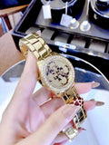 Guess G Twist Diamonds Gold Dial Gold Steel Strap Watch For Women - W1201L2 Authentic Buy Shop Now