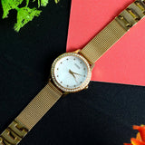 Guess Chelsea Crystals Mother of Pearl White Dial Gold Mesh Bracelet Watch For Women - W0647L7 Authentic Buy Shop Now