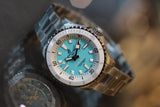 Breitling Superocean Automatic 36 Turquoise Dial Silver Steel Strap Watch for Men - A17377211C1A1 Authentic Buy Shop Now