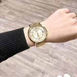 Guess Montauk Gold Dial Gold Steel Strap Watch for Women - W0933L2 Authentic Buy Shop Now