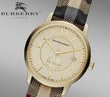 Burberry The Classic Round Gold Dial Brown Leather Strap Unisex Watch - BU10001 Authentic Buy Shop Now