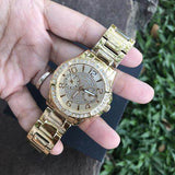 Guess Sassy Analog Quartz Gold Dial Gold Steel Strap Watch For Women - W0705L2 Authentic Buy Shop Now
