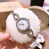 Bulova Crystals Mother of Pearl Dial Two Tone Steel Strap Watch for Women - 98X108 Authentic Buy Shop Now