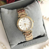 Guess Park Ave South Analog White Dial Gold Steel Strap Watch For Women - W0767L2 Authentic Buy Shop Now