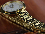 Tissot Flamingo Mother of Pearl White Dial Gold Steel Strap Watch For Women - T094.210.33.111.00 Authentic Buy Shop Now