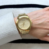 Guess Cubed Analog Gold Dial Gold Steel Strap Watch For Women - GW0606L2 Authentic Buy Shop Now