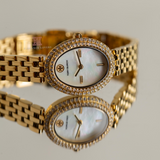 Tory Burch Oval Mother of Pearl Dial Gold Steel Strap Watch for Women - TBW6034 Authentic Buy Shop Now