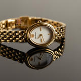 Tory Burch Oval White Dial Gold Steel Strap Watch for Women - TBW6032 Authentic Buy Shop Now