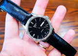 Tissot Automatics III Day Date Black Dial Black Leather Strap Watch For Men - T065.430.16.051.00 Authentic Buy Shop Now