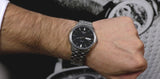 Tissot Automatics III Black Dial Silver Steel Strap Watch For Men - T065.430.11.051.00 Authentic Buy Shop Now