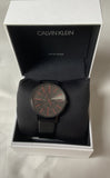 Calvin Klein Boost Black Dial Black Leather Strap Watch for Men - K7Y214CY Authentic Buy Shop Now